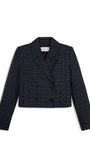 A cropped double-breasted blazer in a dark navy and black plaid pattern, featuring notched lapels and front flap pockets, shown against a plain white background.