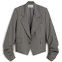 A gray cropped blazer with dramatic gathered sleeves, shown flat against a white background. 