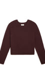 A dark burgundy knit long-sleeve crop sweater with raglan sleeves, laid flat against a solid white background.