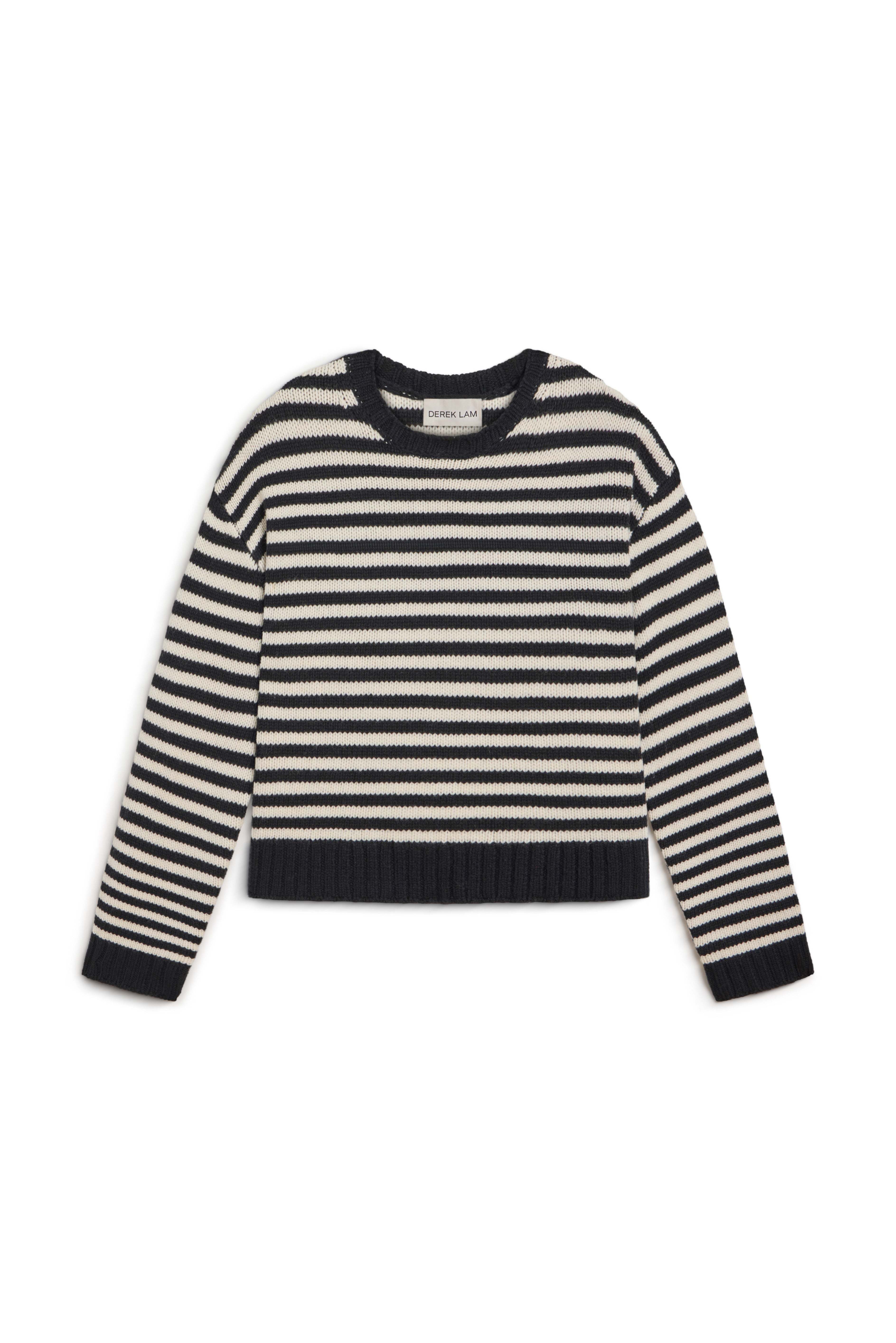 A cropped knit sweater with horizontal black and off-white stripes, featuring long sleeves and ribbed cuffs and hem, displayed on a clean white background.