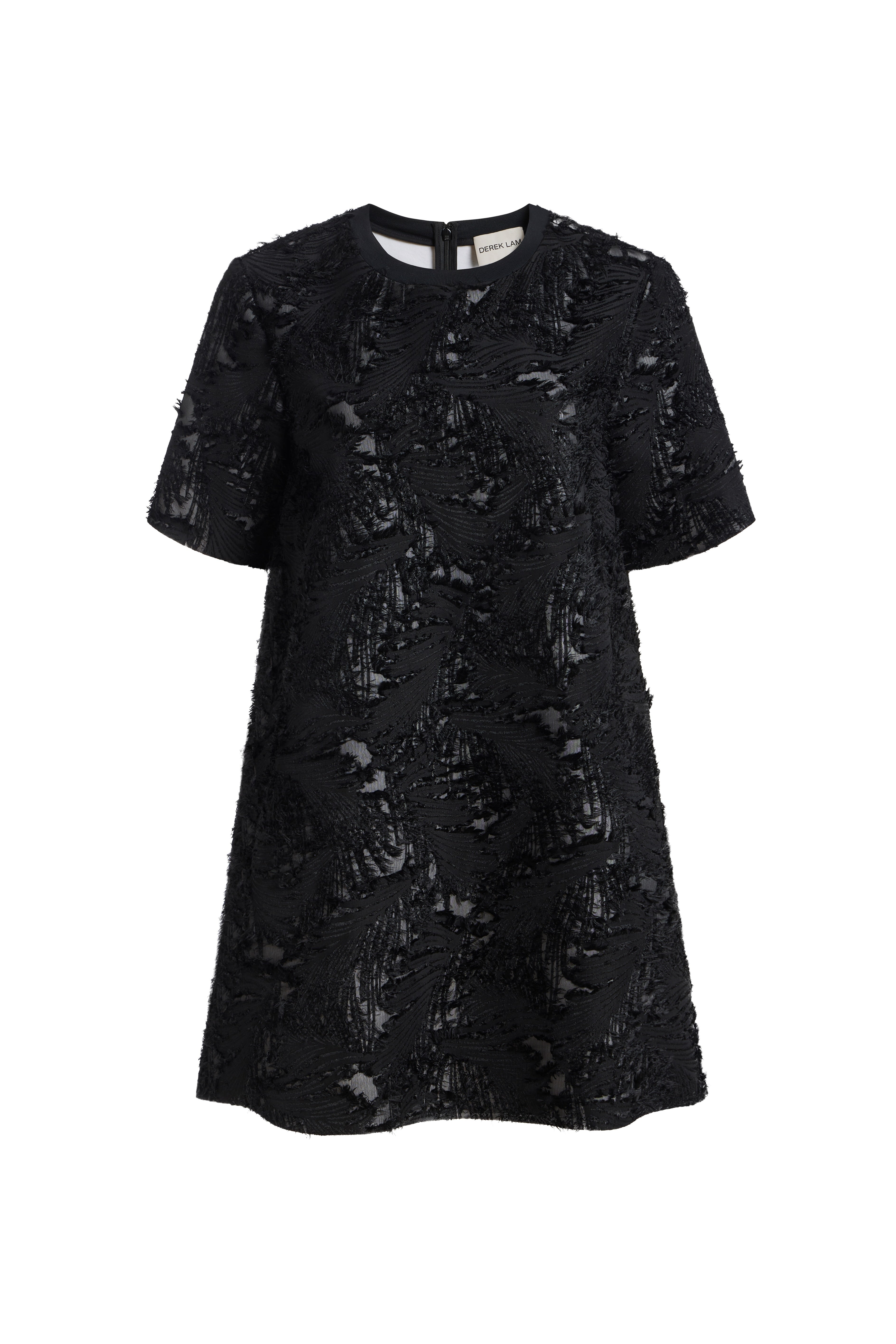 A black short-sleeve tunic dress with a textured, distressed lace-like pattern, shown against a plain white background.