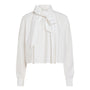 A white long-sleeve blouse with a high collar and a large bow tied at the front, shown against a plain white background.