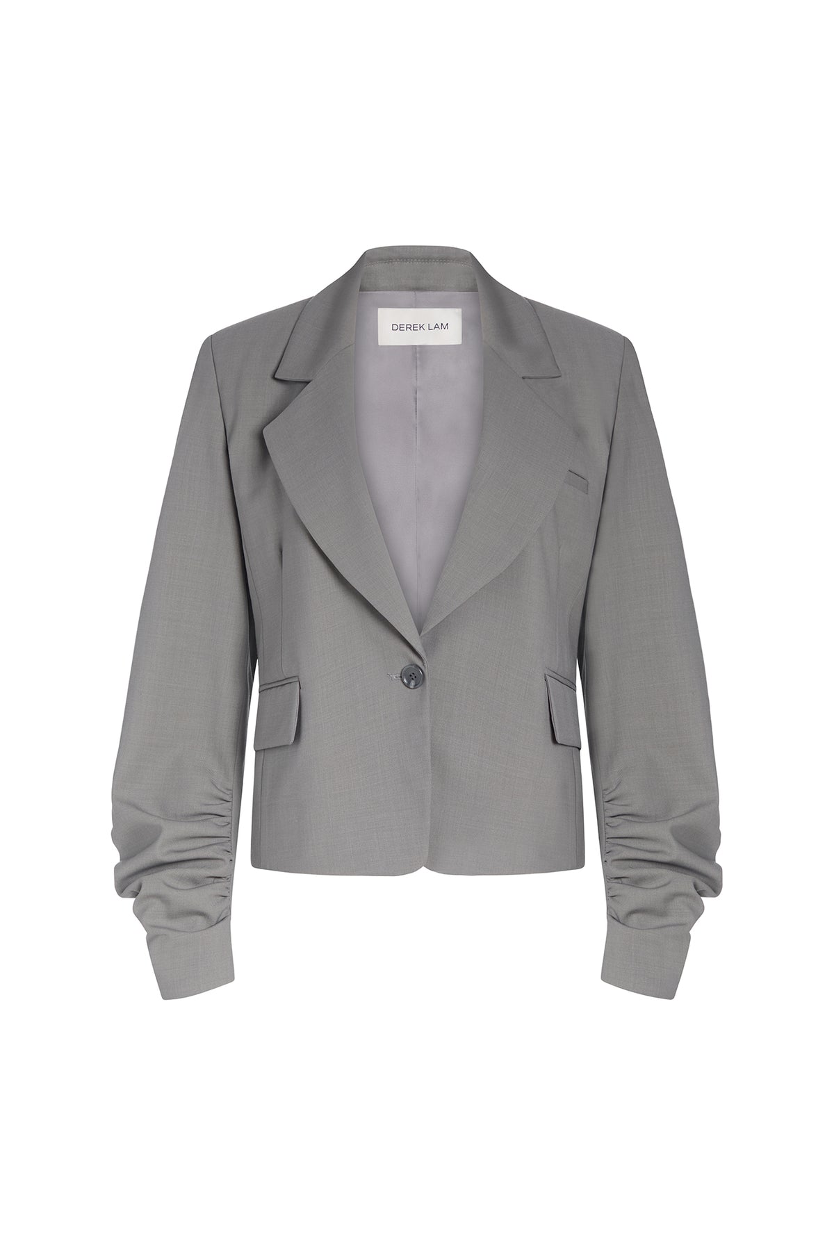 A gray cropped blazer with dramatic gathered sleeves, shown flat against a white background. 
