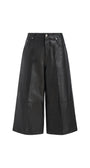Black faux leather cropped wide-leg pants with pleated front panels, shown flat on a white background.
