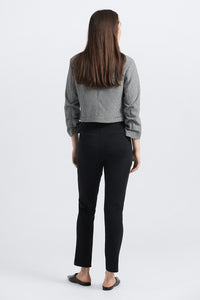 Black pant paired with a houndstooth Jacket 