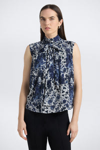 Blue floral top with tie neck 