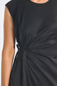 Close up of Black dress with tied waist